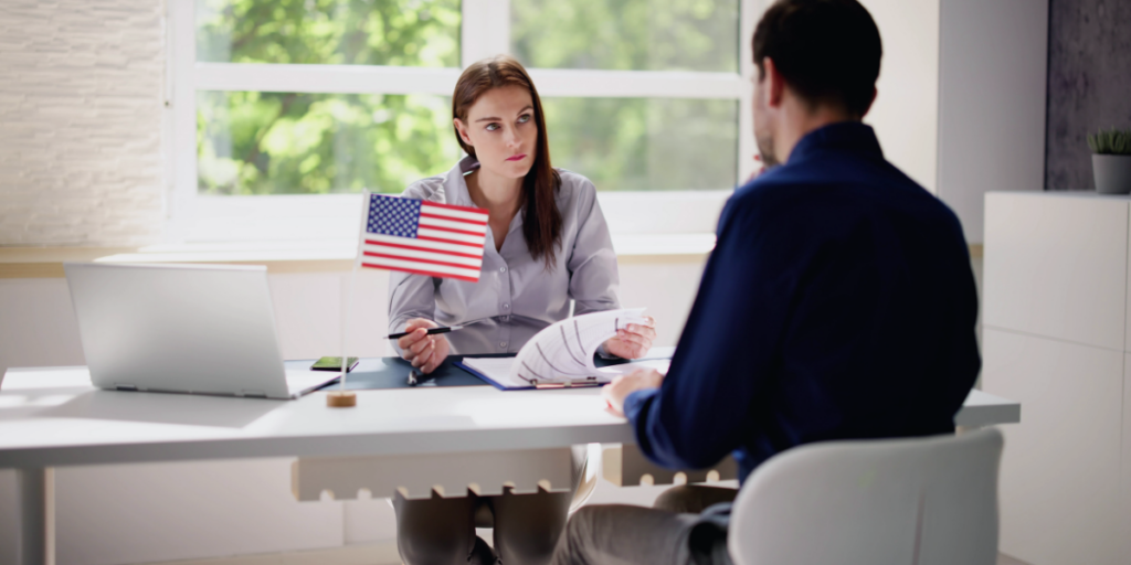 Woman holding a small US flag