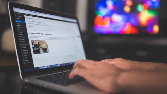 Writing a blog post about promoting a new blog post in a laptop