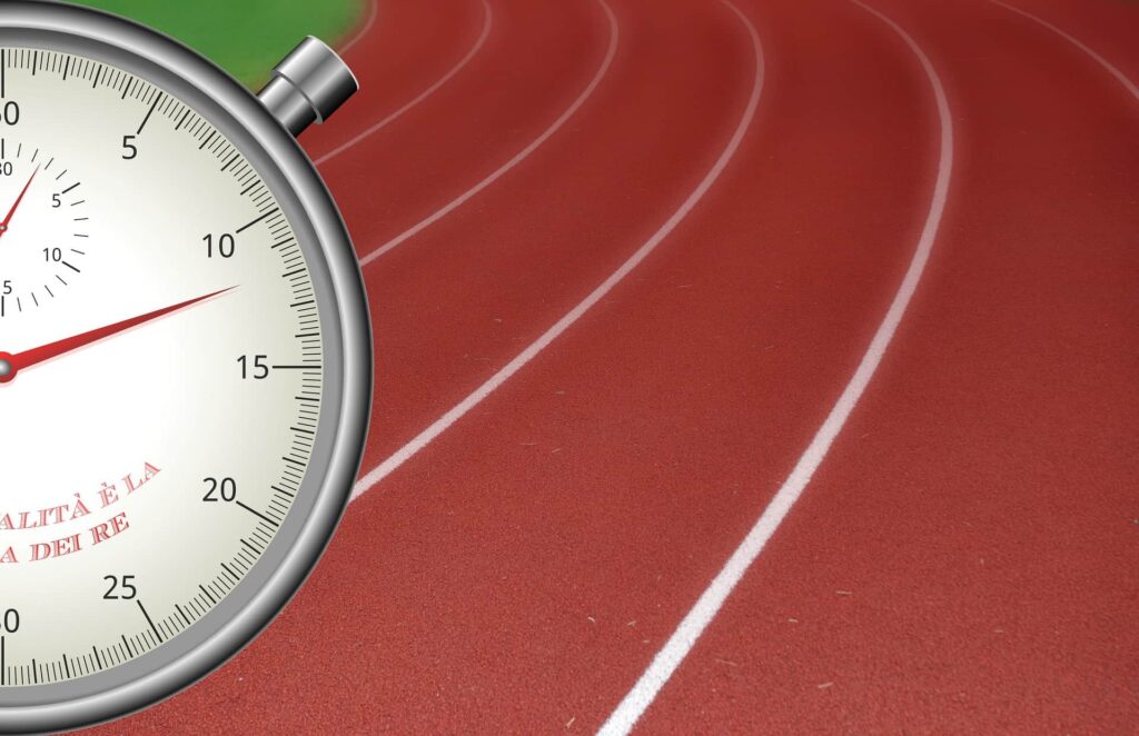 Stopwatch on a running track representing the impact of site speed on SEO performance