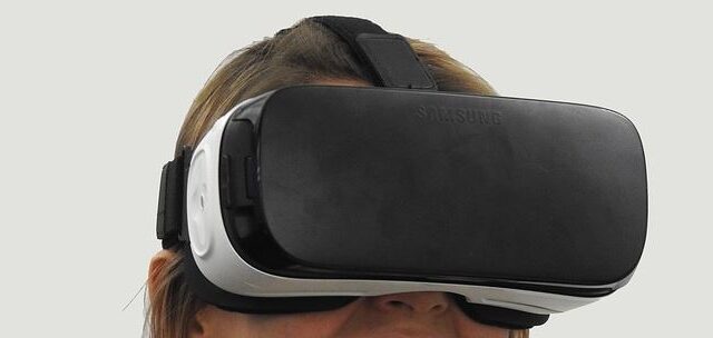 Person wearing a Samsung Gear VR headset close-up view