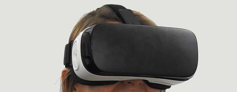 Person wearing a Samsung Gear VR headset close-up view
