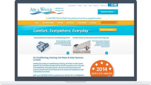 Air and Water website displayed on a laptop screen showing air conditioning and solar services homepage