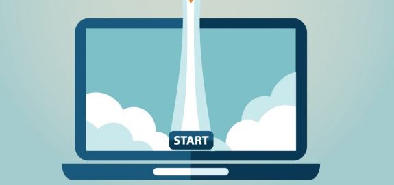 Flat illustration of a rocket launching from a laptop screen labelled Start