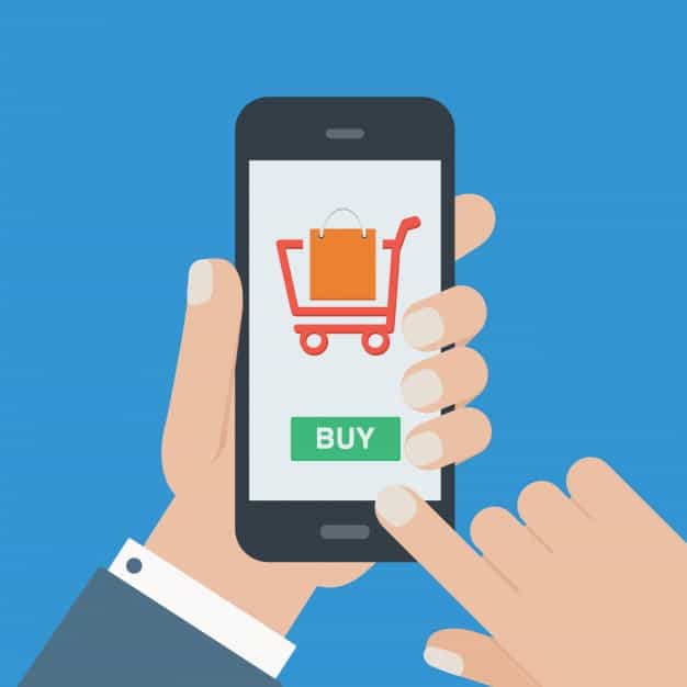 Hand holding a smartphone with a shopping cart icon and Buy button on screen, representing mobile ecommerce checkout