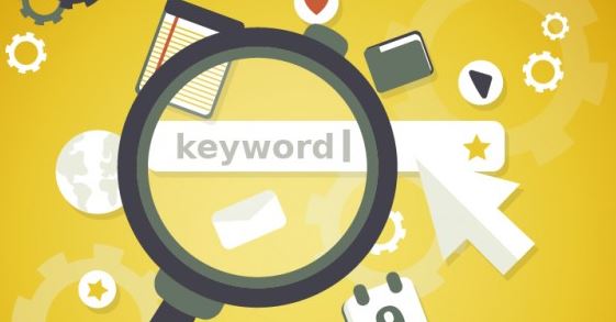 Flat illustration of a magnifying glass over a keyword search bar surrounded by digital marketing icons on yellow background