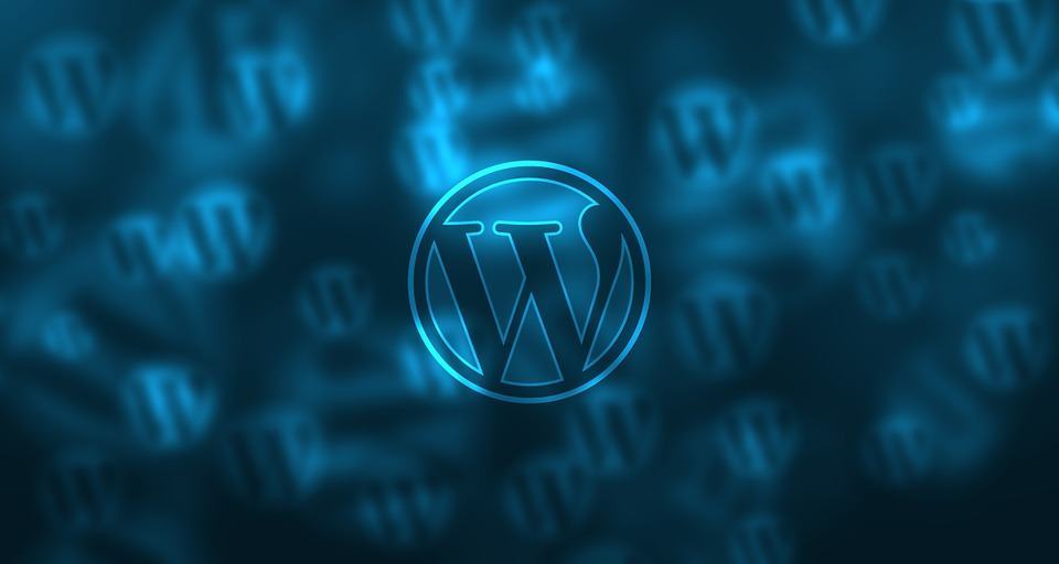 WordPress logo glowing in blue neon light, illustrating WordPress email delivery issues