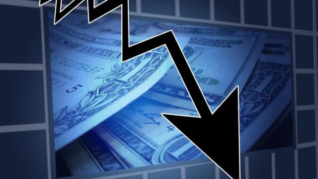 Downward arrow over US dollar bills, representing financial loss from poor conversion rates