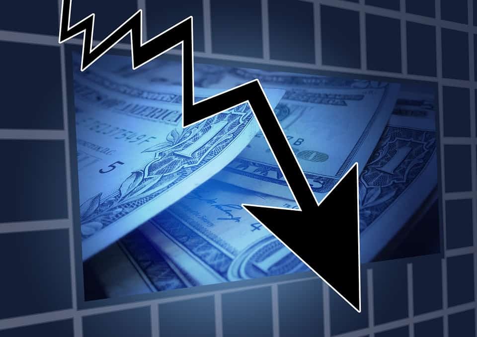 Downward arrow over US dollar bills, representing financial loss from poor conversion rates